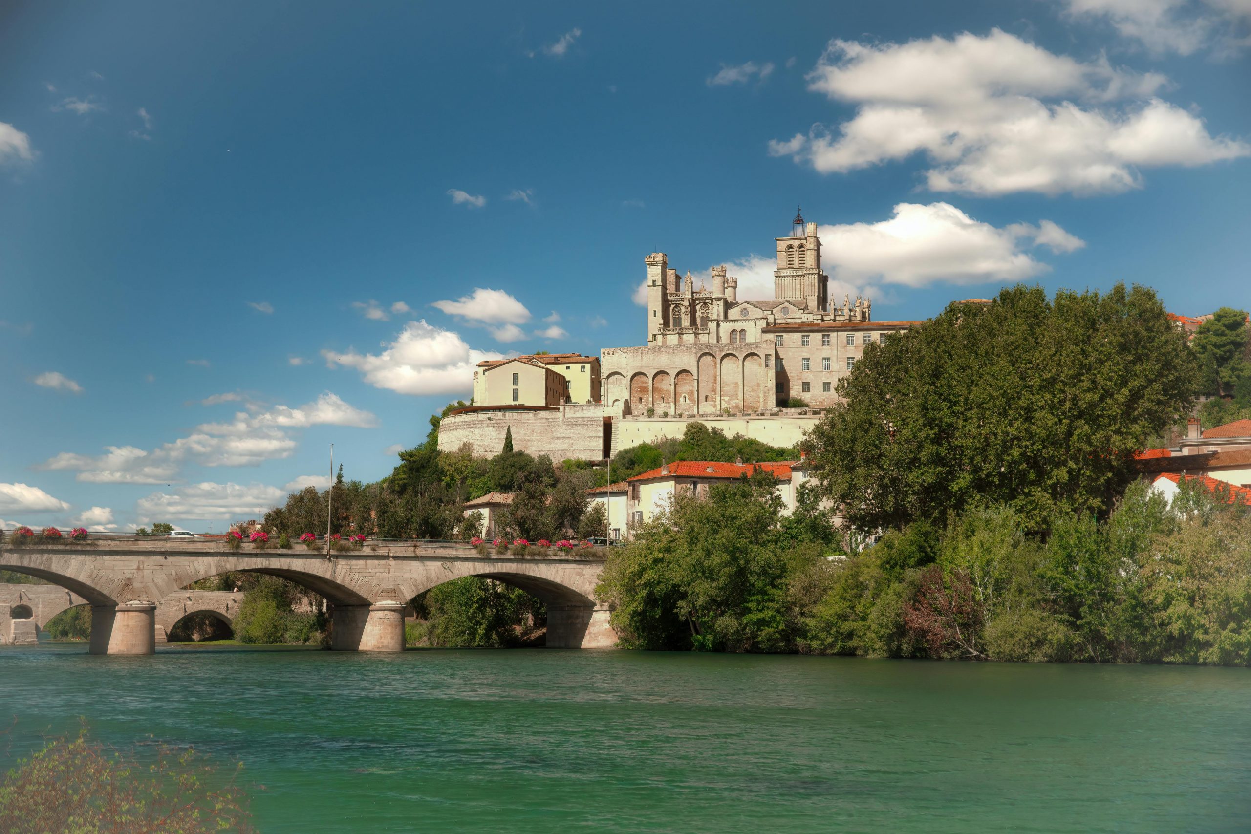 Beautiful view of Saint Nazaire Cathedral overlooking the Orb river in Béziers, France.